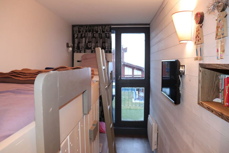 Chambre ferm�e avec lits superpos�s et lit simple